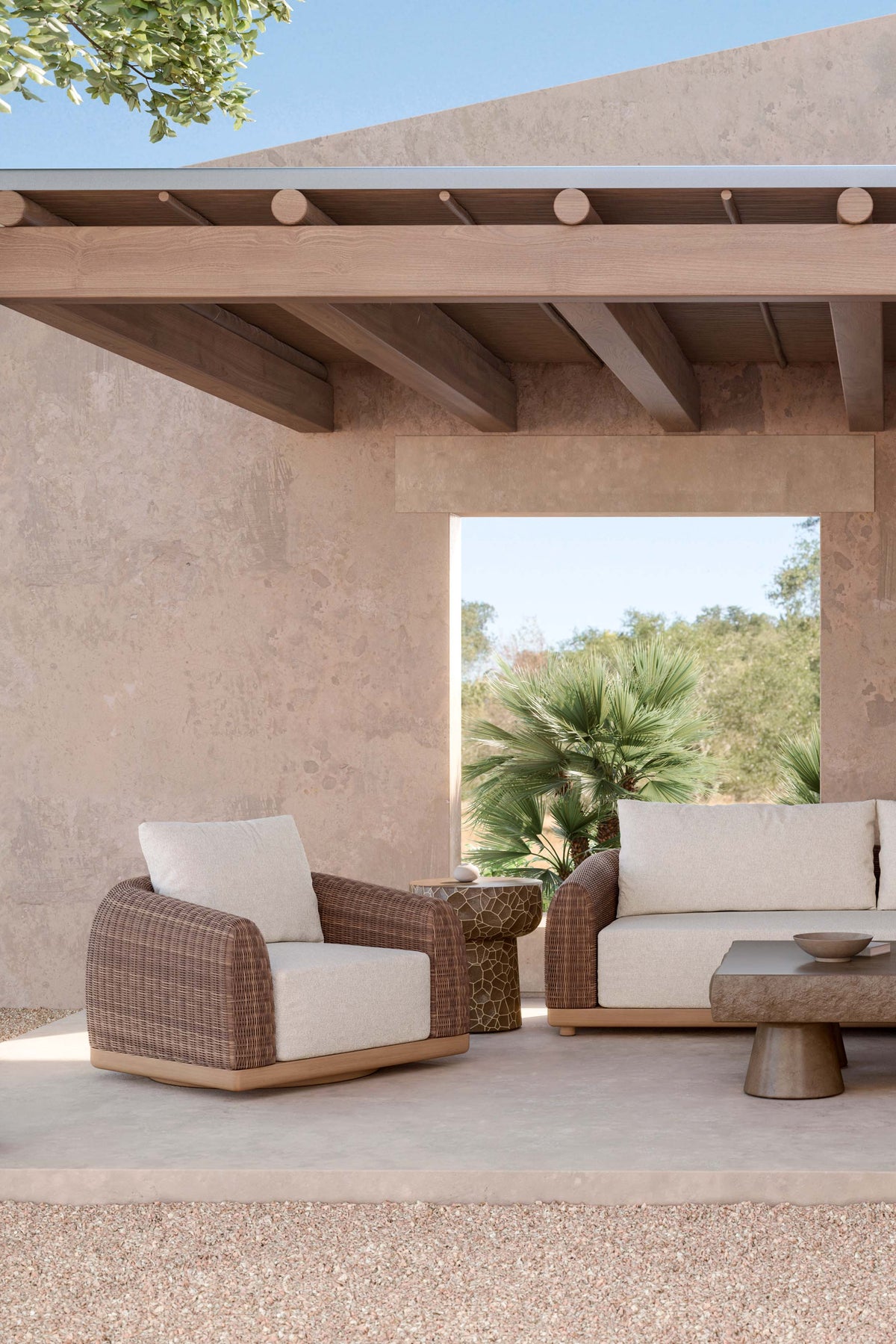 Aspen lounge chair and sofa in a shaded courtyard